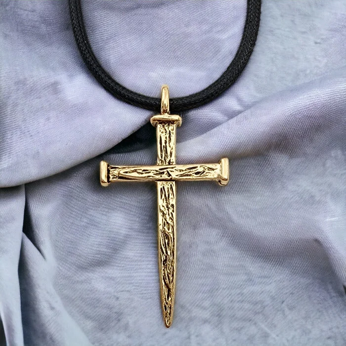 Colorful Gemstone Necklaces-Nail Cross Large Rugged Gold Metal Finish Pendant Black Cord Necklace