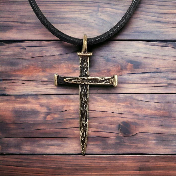 Designer Heart Pendant Necklaces-Nail Cross Large Rugged Antique Brass Finish Pendant Black Cord Necklace